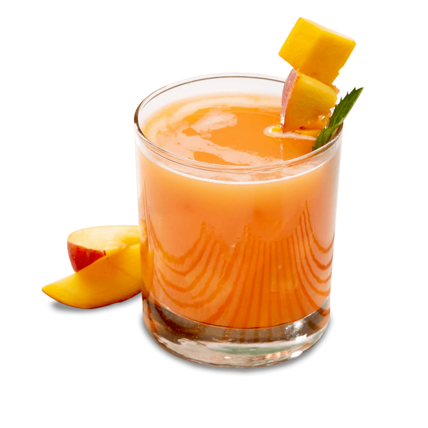 Refreshing protein drink in a glass, garnished with mango and apple, perfect for post-workout recovery.